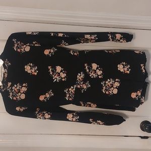 Floral open back rumper size medium